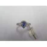 A 18ct white gold pear shaped sapphire and diamond ring - 0.27ct diamonds - ring size O - approx