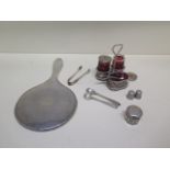 A silver and ruby glass cruet set, top loose to mustard and two spoons are plated but glass good - a