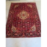 A handmade Shiraz rug - 215cm x 153cm - just been professionally cleaned and in good condition