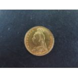 A Victorian gold half sovereign dated 1887