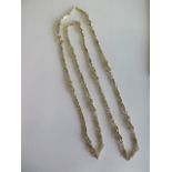 A 10ct yellow gold 79cm chain approx 19.2 grams - in good condition