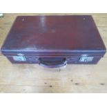 A vintage leather suitcase - 16cm x 60cm x 36cm - in polished condition