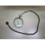 A silver key wind pocket watch with chain - crack to dial but running - 50mm case - with key
