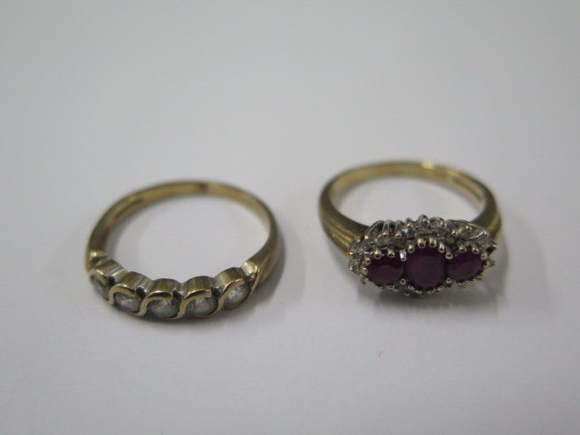 Two 9ct yellow gold rings, one missing a small stone - ring sizes O and P - total weight approx 5.