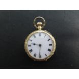 An 18ct gold top wind pocket watch - 31mm case - not currently running