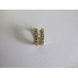 A pair of 14ct yellow gold diamond earrings approx 14mm long, approx weight 1 gram total - good