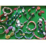 An assortment of costume and other jewellery to include bracelets, necklaces and pendants - ex