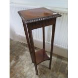 A mahogany jardiniere stand - Height 97cm
