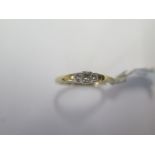 A 9ct yellow gold princess cut three stone ring size N - approx weight 1.6 grams - ex jewellers