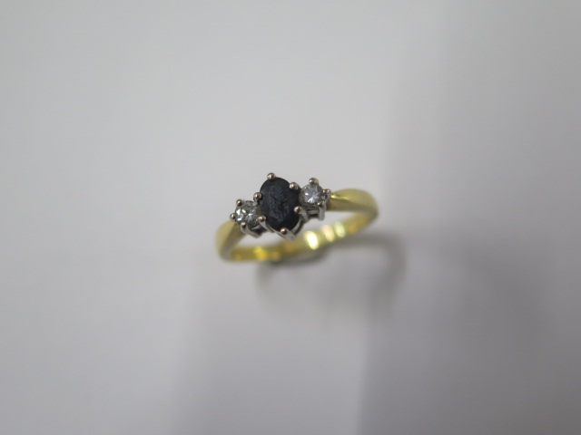 A hallmarked 18ct yellow gold diamond and sapphire ring size O/P - approx weight 4.2 grams -