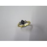 A hallmarked 18ct yellow gold diamond and sapphire ring size O/P - approx weight 4.2 grams -