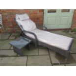 A new Maze Rattan Florida sun lounger with a drinks table - cheapest internet prince £279