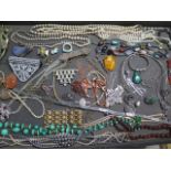 An interesting collection of assorted costume and silver jewellery