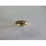 A 14ct yellow gold diamond nine stone ring size M - approx weight 4.5 grams - generally good