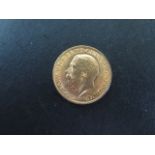 A George V full gold sovereign dated 1913