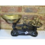 A set of new kitchen scales with weights