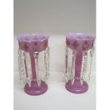 A pair of pink glass lustres - Height 26cm - both good, minor chips to lustres