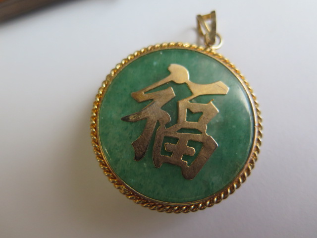 A gilt metal pin brooch, gilt metal Chinese pendant, gilt metal fobs and watch key and a gilt - Image 4 of 6