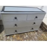 A 19th century chest of drawers repainted in a grey colour with black knobs - Width 132cm x Depth