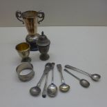 Six assorted silver spoons, a napkin ring, a cup on stand, egg cup and pepper - weighable silver