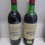 Two bottles of Chateau Haut-Marbuzet red wine 1978 - levels good on one, slightly low on the other