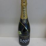 A bottle of Moet & Chandon 2004 Grand Vintage Champagne