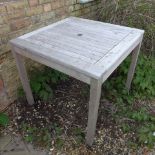 A weathered hardwood garden table - 80cm Square