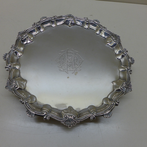 A silver salver - Diameter 23cm - London 1901/02 - approx weight 13.8 troy oz - engraved to
