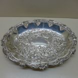 A silver embossed oval dish - 29cm x 22cm - London 1900/01 - approx weight 14.3 troy oz - no