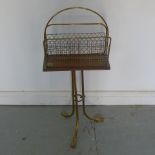 A 19th century brass and mahogany magazine rack