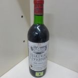 A bottle of Chateau Liversan Haut Medoc 1979 - level good