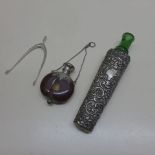A silver mounted bottle - Length 18cm - a white metal mounted scent bottle - both with wear/damage -