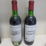 Two bottles of Chateau Houissant red wine 1975 - Levels good on one slightly lower on the other