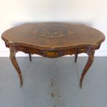 A 19th century walnut and marquetry bureau plat with a shaped top of a single drawer on cabriole
