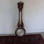 A 19th century mahogany and inlaid banjo barometer the silvered dial signed G Mache, Cambridge -