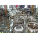 A collection of assorted silver plated ware including coasters