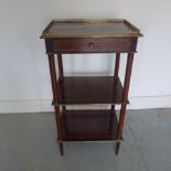 A 19th century mahogany and brass inlaid side table with a single drawer - Height 77cm x Width 42cm