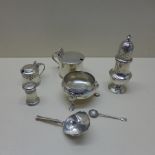 Six silver cruet items and a silver caddy spoon - weighable silver approx 12 troy oz - small mustard