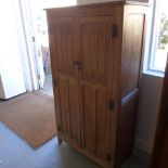 A limed oak small wardrobe with linen fold doors - Height 150cm x Width 84cm
