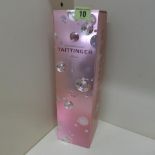 A boxed bottle of Tattinger pink Champagne