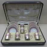 An Aynsley coffee set, six setting with silver cup holders Birmingham 1923/24 - boxed - in good