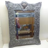 A large white metal mounted easel back mirror - 70cm x 53cm - mirror has slipped in frame, slight