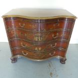 A mahogany decorated serpentine four drawer chest with a brushing slide - Width 95cm x Height 82cm x