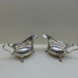 A pair of silver sauce boats - Length 18cm - Birmingham 1927/28 - approx weight 13 troy oz - both