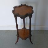 A 19th century marquetry two tier side table with a brass gallery - Height 74cm