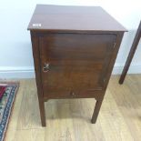 A Georgian mahogany bedside cupboard with a single drawer - Height 70cm