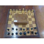 A boxwood and ebonised weighted chess set with board, King approx 8cm - some wear to black pieces ot