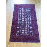 A handmade vintage rug - 142cm x 83cm