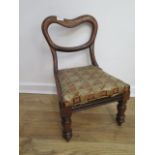 A 19th century rosewood child's chair - height 54cm