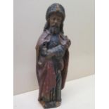 A polychrome decorated carved wood Religious figure - Height 35cm - some losses and signs of worm